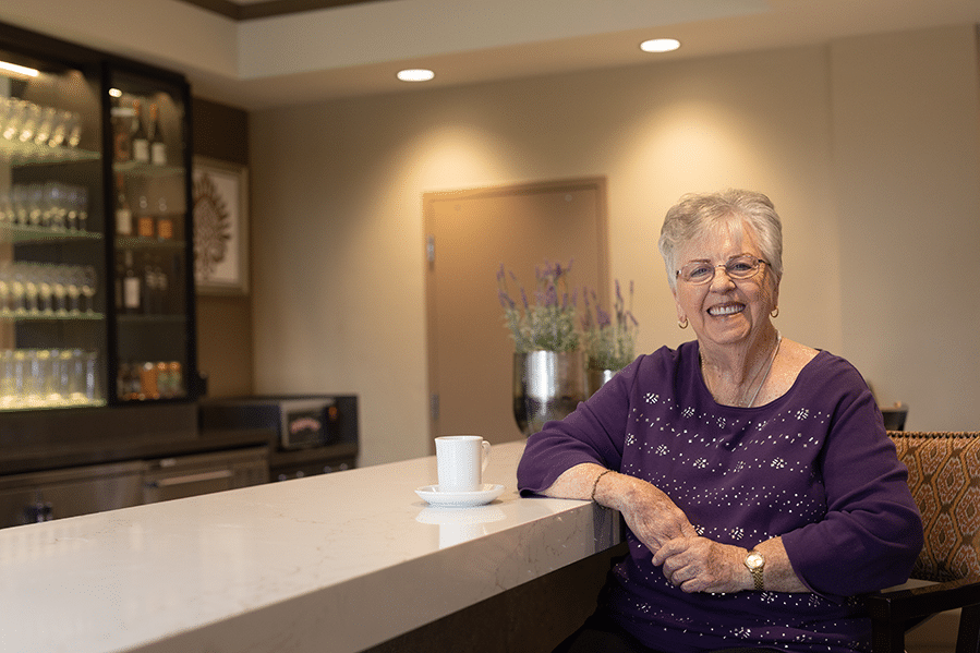 Senior woman at bar